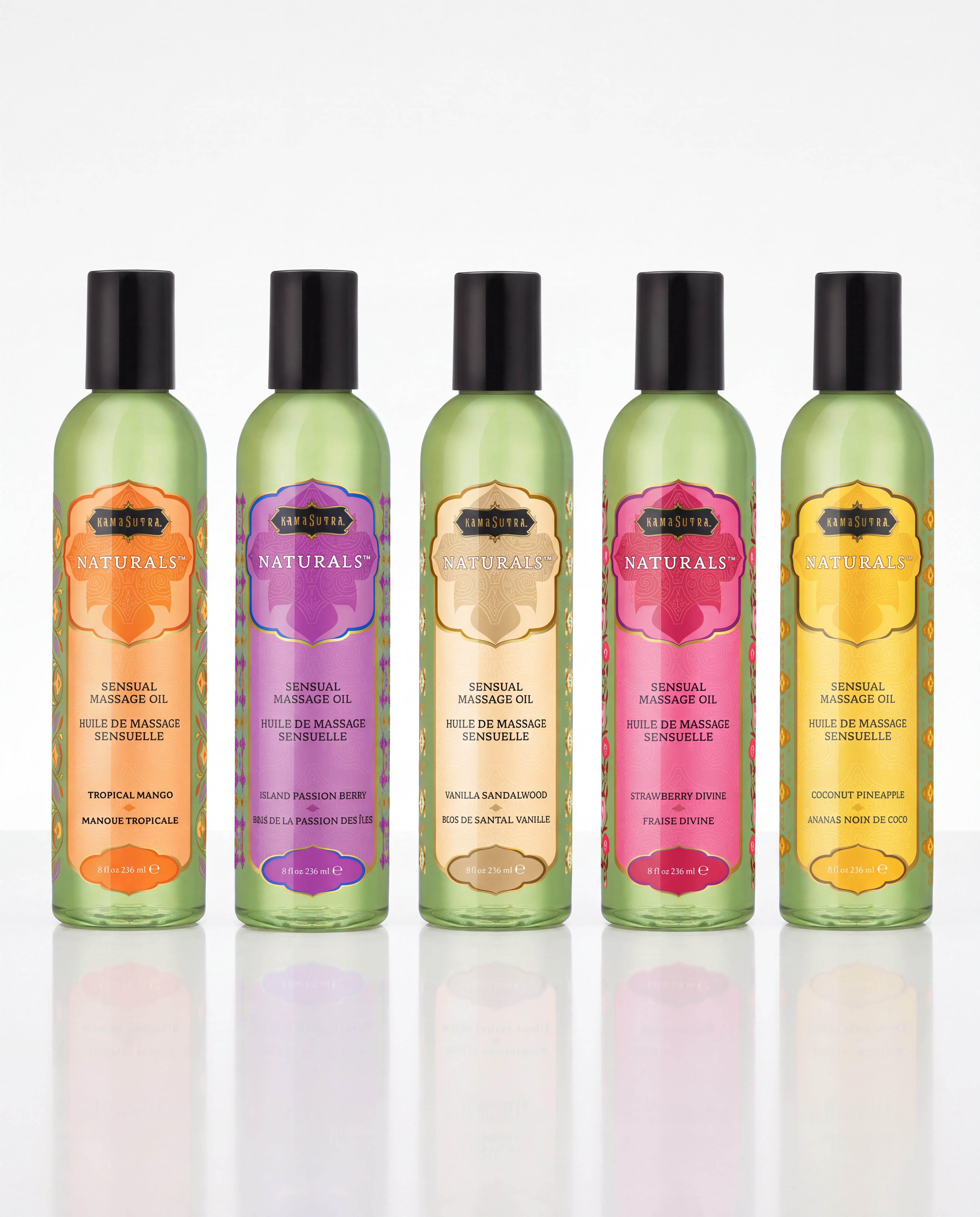 A group of 5 Naturals Massage Oils (8oz) in Tropical Mango, Strawberry Dreams, Vanilla Sandalwood, Island Passion Berry, and Coconut Pineapple scent-eachi in a green bootle with black cap. The Kama Sutra Company