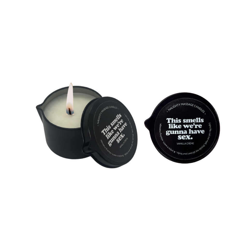 Massage candle with black lid and white candle, labeled 'This smells like we're gonna have x.'