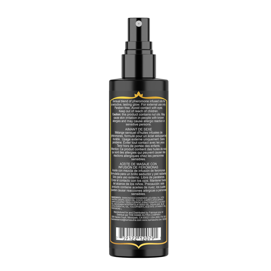 Black spray bottle with backside of label on a white background