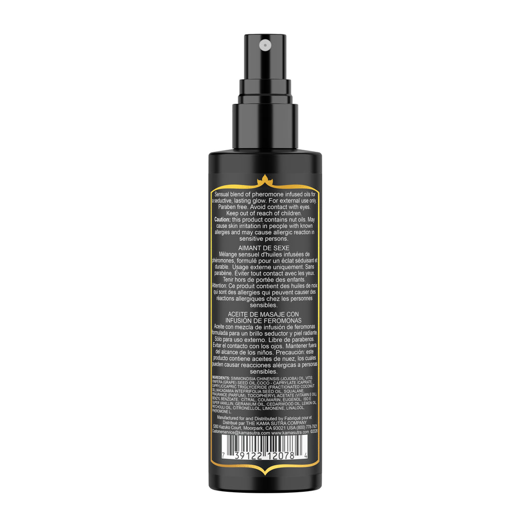 Black spray bottle with backside of  label on a white background