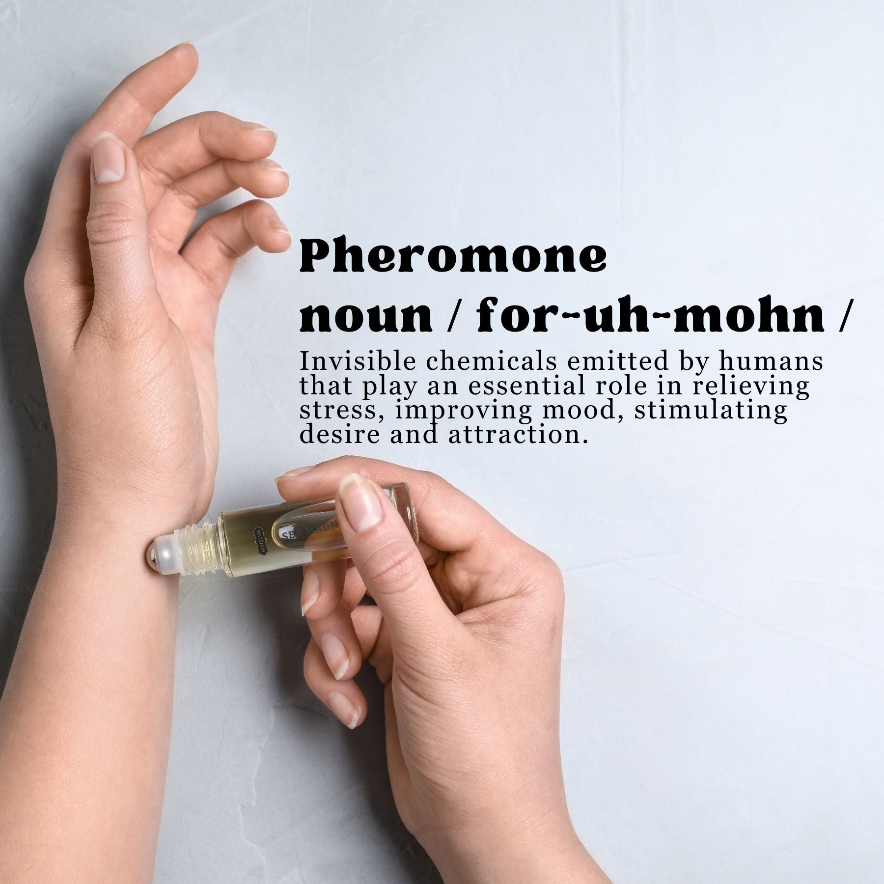 Hand applying a small bottle of pheromone product to another hand with a definition of 'pheromone' text.