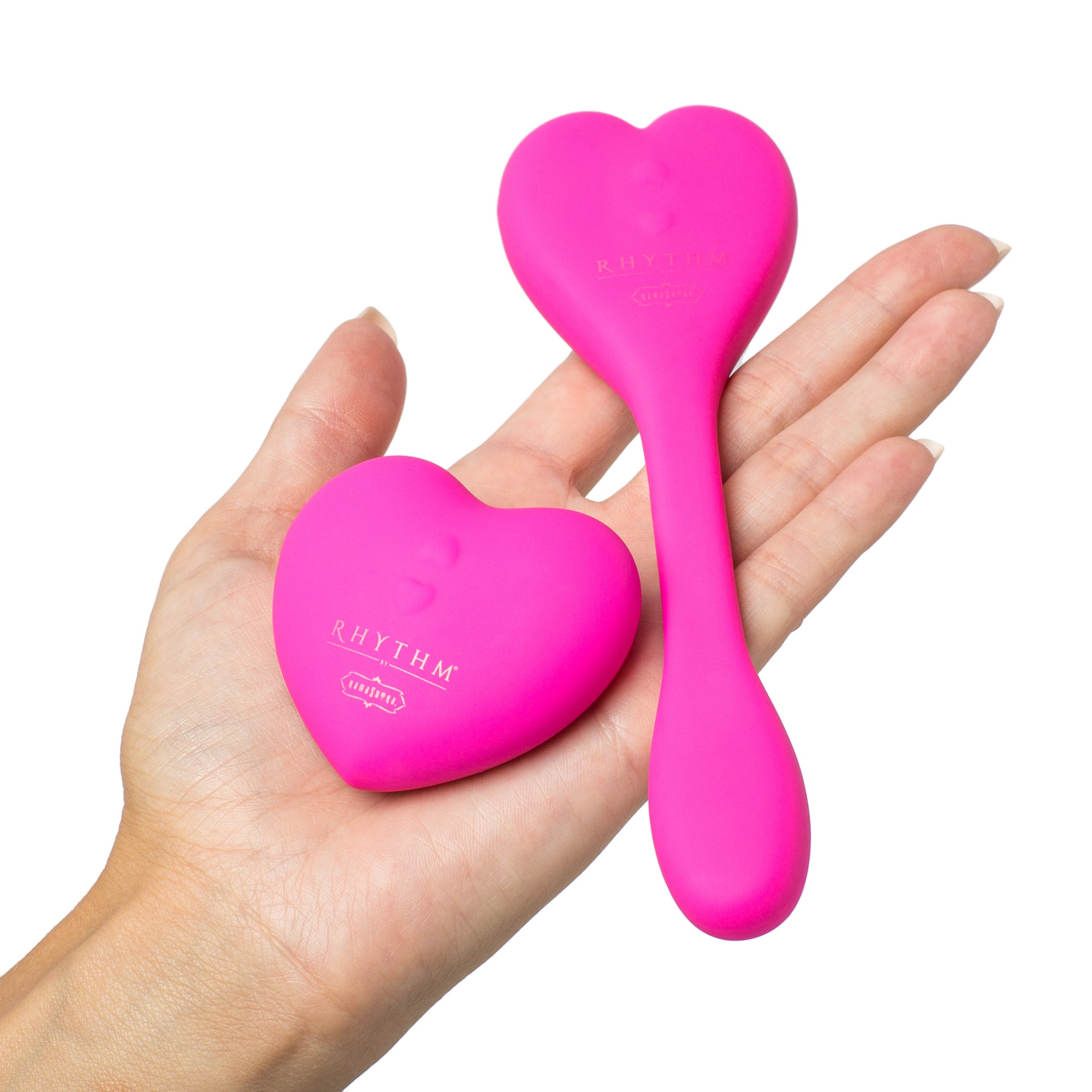 Natya  couples toy in pink color. heart shaped remote and flexible toy in models hands- The Kama Sutra 