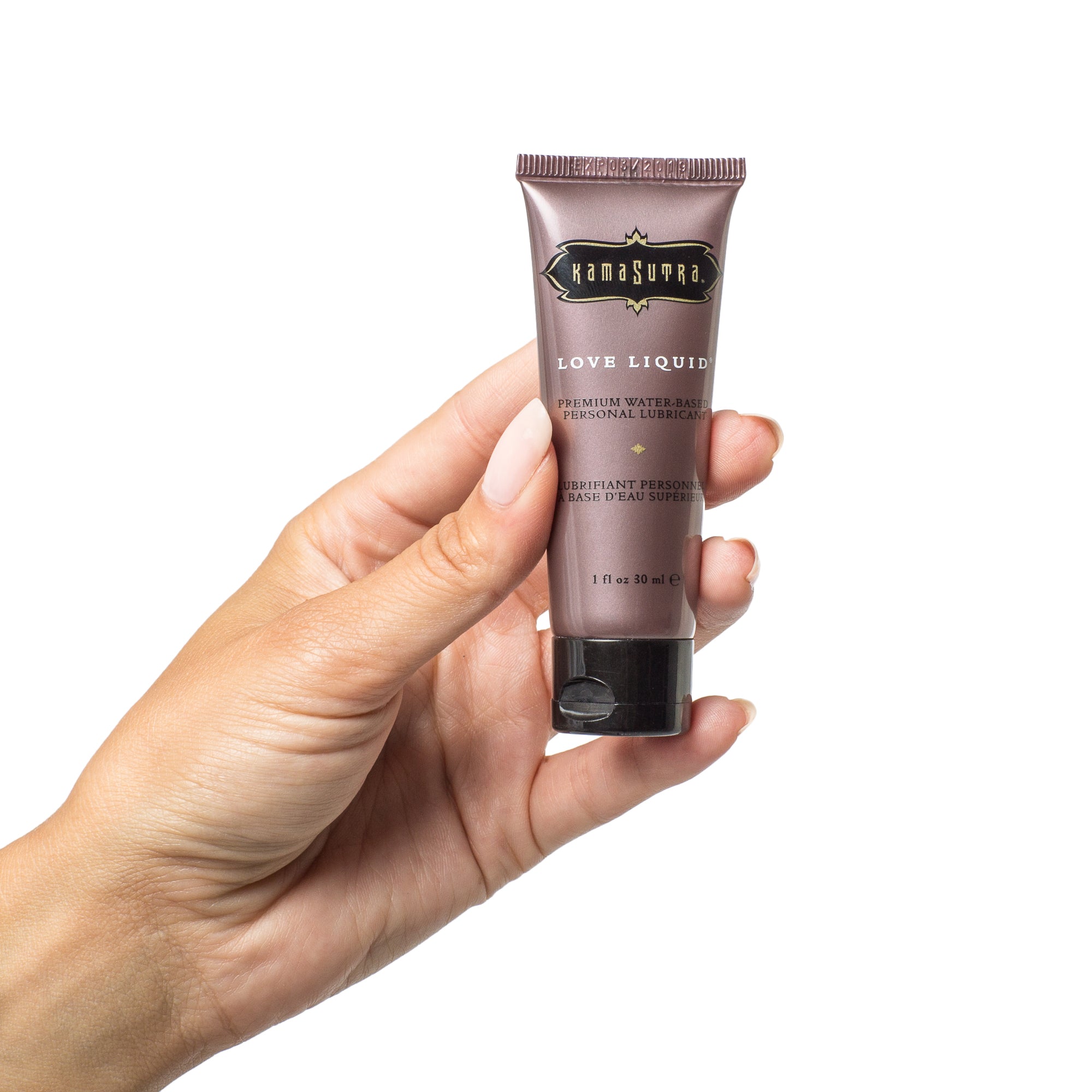 photo of 1fl oz size tube of Love Liquid water based lubricant in models hand