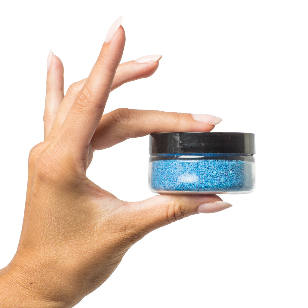 photo of Treasures of the Sea bath salts in models hand