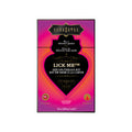 The image displays the packaging of the Kama Sutra LICK ME Sex-To-Go Kit. The box is predominantly pink and purple, with a heart shape in the center that contains the product name "LICK ME".