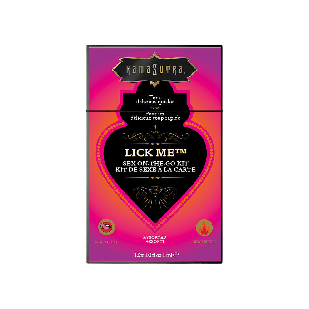 The image displays the packaging of the Kama Sutra LICK ME Sex-To-Go Kit. The box is predominantly pink and purple, with a heart shape in the center that contains the product name "LICK ME".